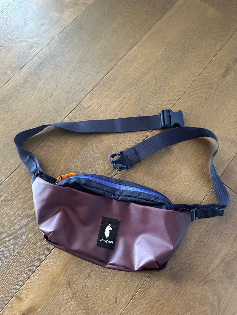 cotopaxi Burgundy Waist Pack with Navy Strap and Blue Zipper